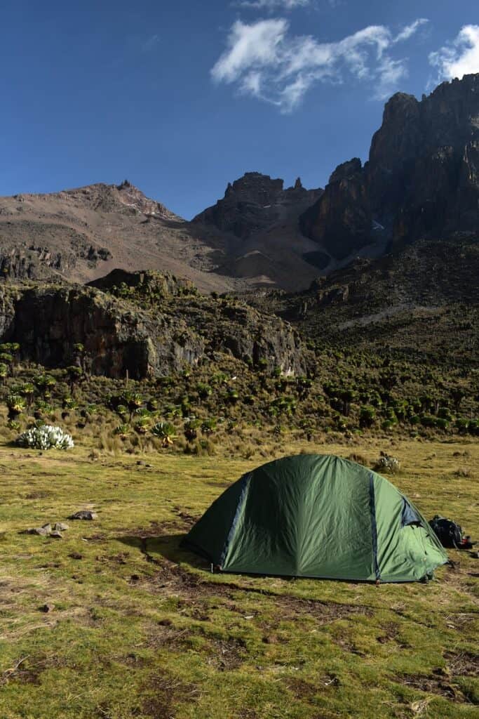 green dome tent near hills